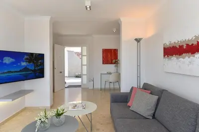 Una televisión o centro de entretenimiento en Chalet Santa Ana 19 by VillaGranCanaria
