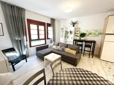 Zona de estar de Velarde Deluxe Beach Flat byCanary365