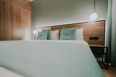 Cama o camas de una habitación en Catalina Plaza Hotel Sostenible