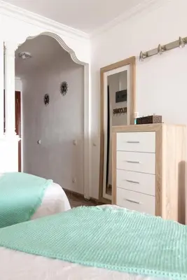 Cama o camas de una habitación en Beautiful apartment on the beachfront