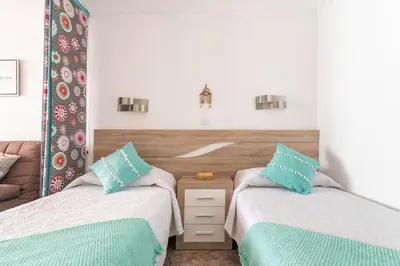 Cama o camas de una habitación en Beautiful apartment on the beachfront