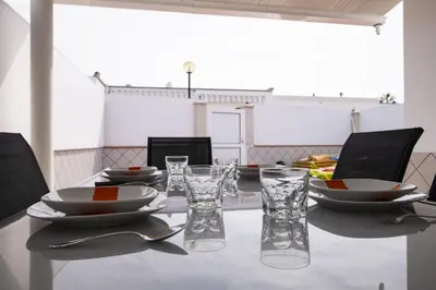 Zona de estar de G g spacious bungalow in maspalomas