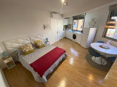 Cama o camas de una habitación en Estudio D’Lelos