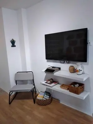 Una televisión o centro de entretenimiento en Estudio Suites Cantera Auditorio