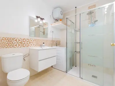 Un baño de FIRST LINE MOGAN BEACH - Parking free