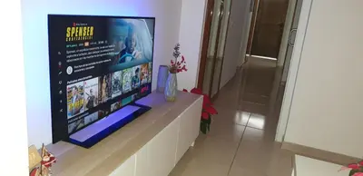 Una televisión o centro de entretenimiento en Playa del Ingles. Apartamento al lado del océano