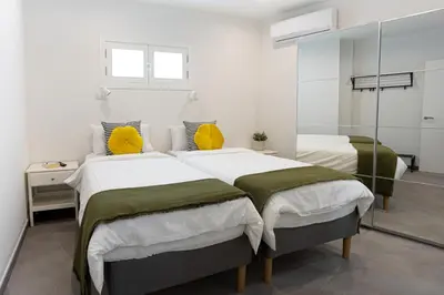 Cama o camas de una habitación en HD Mogán Canal Apartments