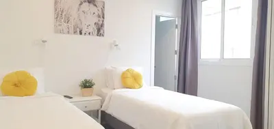 Cama o camas de una habitación en HD Mogán Canal Apartments