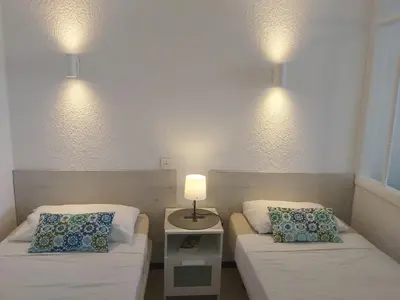 Cama o camas de una habitación en Beach Apartment 9