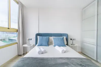 Cama o camas de una habitación en Home2Book Design Las Canteras2 Beach