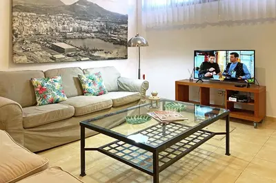 Una televisión o centro de entretenimiento en Bahía Meloneras 71