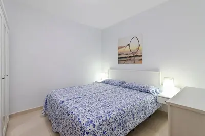 Cama o camas de una habitación en Arinaga Playa 2