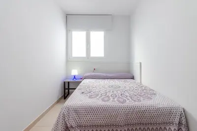 Cama o camas de una habitación en Arinaga Playa 3