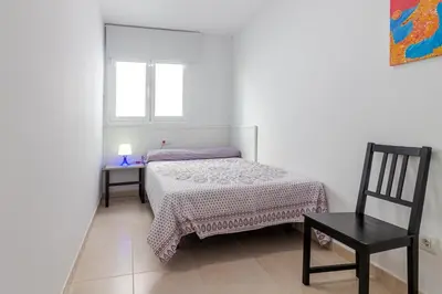 Cama o camas de una habitación en Arinaga Playa 3