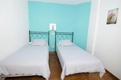 Cama o camas de una habitación en Comfortable apartment in Lomo Quiebre, sea view and mountain