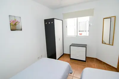 Cama o camas de una habitación en Comfortable apartment in Lomo Quiebre, sea view and mountain