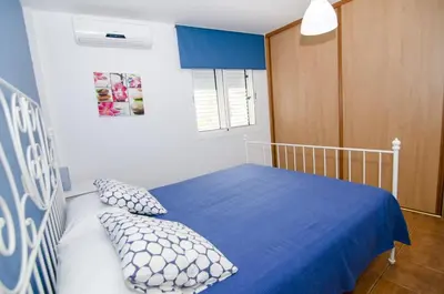 Cama o camas de una habitación en Comfortable apartment in Lomo Quiebre, sea view and mountain