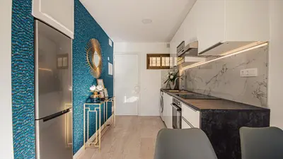Una cocina o zona de cocina en Don Quijote Apartment