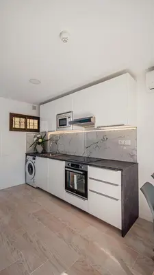 Una cocina o zona de cocina en Don Quijote Apartment