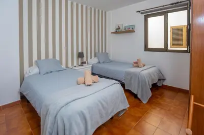 Cama o camas de una habitación en Casa Playa María