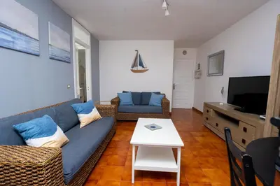 Una televisión o centro de entretenimiento en Casa Playa María