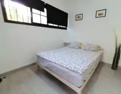 Cama o camas de una habitación en breakfast in the sun