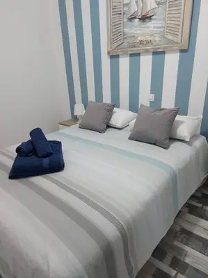 Cama o camas de una habitación en Nueva Europa apartamentos