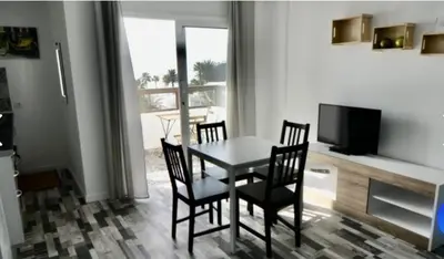Una televisión o centro de entretenimiento en Nueva Europa apartamentos
