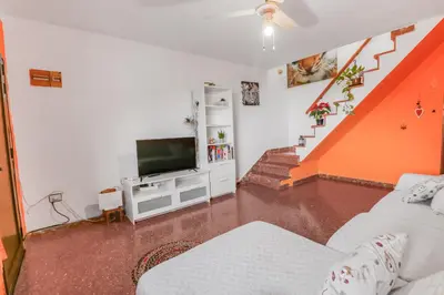 Una televisión o centro de entretenimiento en El Risco Double Bed Apart 2-BR
