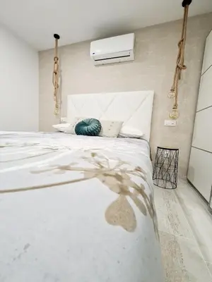 Cama o camas de una habitación en Pearl In The Ocean