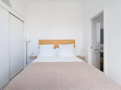 Cama o camas de una habitación en CANTERAS PLAYA APARTMENTS