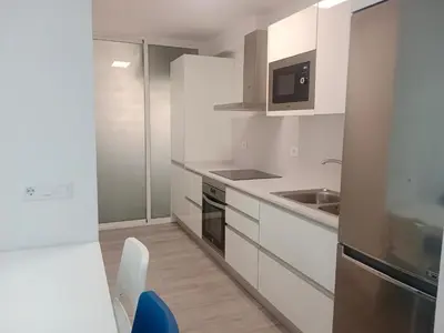 Una cocina o zona de cocina en Las Olas Blue