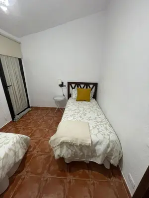 Cama o camas de una habitación en Vista Faro Sardina