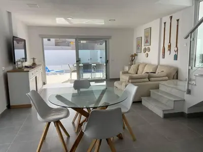 Zona de estar de Casa de Playa maravillosa en Taliarte