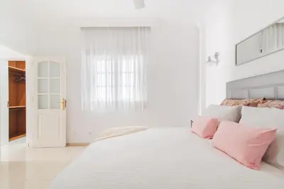 Cama o camas de una habitación en Home2Book Comfy Duplex La Isleta, BBQ & Wifi