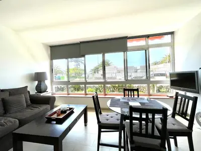 Zona de estar de Apartamento vacacional sur de Gran Canaria, segunda linea de playa con wifi