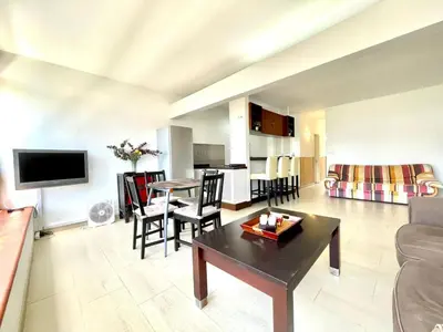 Una televisión o centro de entretenimiento en Apartamento vacacional sur de Gran Canaria, segunda linea de playa con wifi