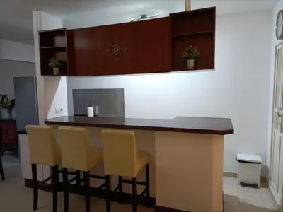 Una cocina o zona de cocina en Apartamento vacacional sur de Gran Canaria, segunda linea de playa con wifi