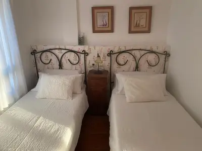 Cama o camas de una habitación en VV El Almendro