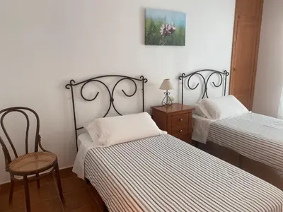 Cama o camas de una habitación en VV El Almendro