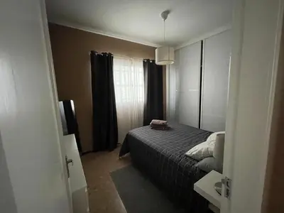 Cama o camas de una habitación en La Garita Bay Apartments