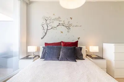 Cama o camas de una habitación en Brand New Apartment with Ocean & Volcano Views