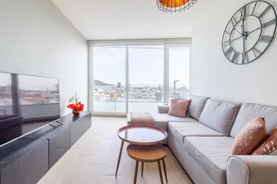 Zona de estar de Brand New Apartment with Ocean & Volcano Views