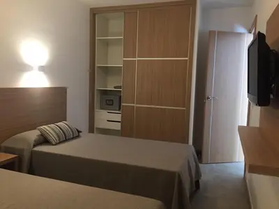Cama o camas de una habitación en Alsol Los Leones Bungalows - Adults Only