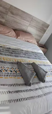 Cama o camas de una habitación en Arguineguin Beach, Penthouse Apartment and jacuzzi