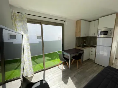 Una cocina o zona de cocina en Arguineguin Beach, Penthouse Apartment and jacuzzi