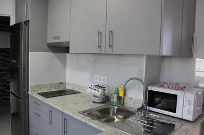 Una cocina o zona de cocina en Bonito y Cómodo by CASAS COCODRILO