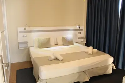 Cama o camas de una habitación en Apartamentos Fayna