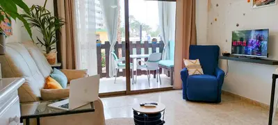 Una televisión o centro de entretenimiento en Playa del Ingles, 4 min a pie de la playa