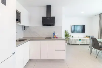 Una cocina o zona de cocina en Modern Flat Las Canteras